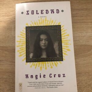 Soledad by — White & Yellow Paperback Novel